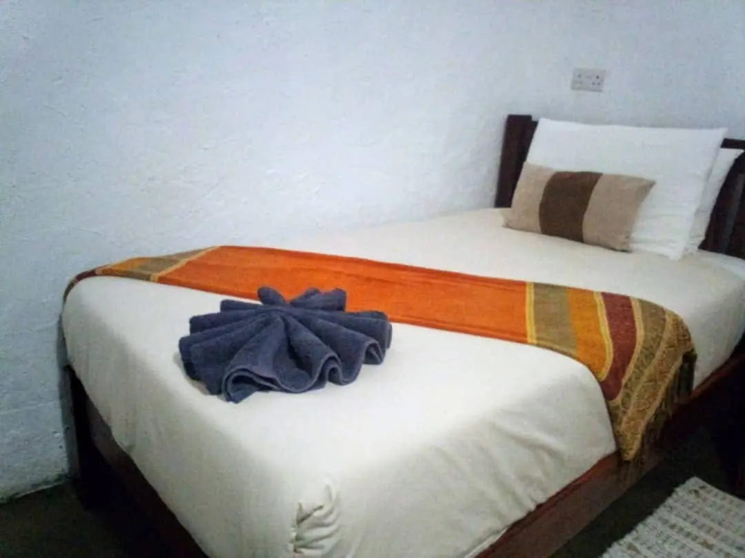Double bed with a towel fan